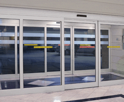Automatic sliding door in commercial building