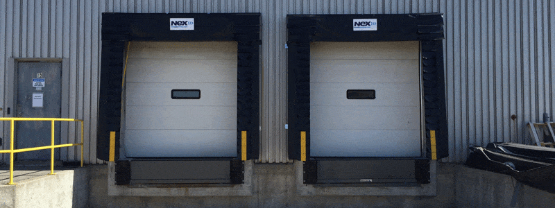 Pair of commercial dock doors with levelers