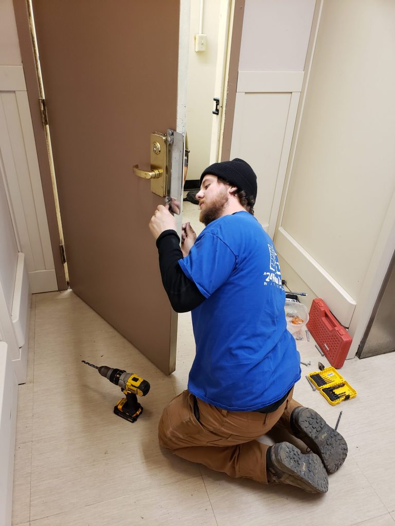 Professional commercial door installation in Cincinnati, OH by A 24 Hour Door. The image shows a heavy-duty metal door with secure hardware and frame, reflecting expert service for local businesses.