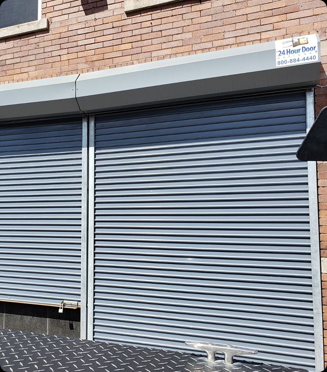Rolling steel commercial doors installed in Cincinnati, OH by A 24 Hour Door, providing secure and durable entry solutions.