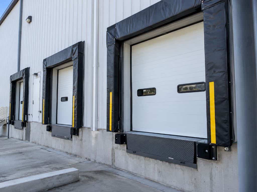 Commercial loading dock doors for Dock Door Installation and Replacement Buffalo NY at an industrial facility.